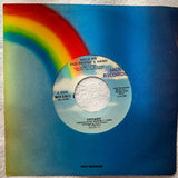 Tiffany -- 45 record  Hold An Old Friends Hand / Ruthless =  7" vinyl